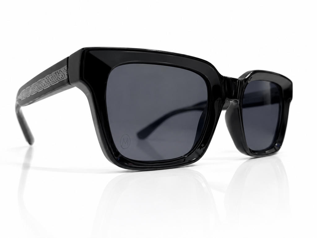 Black sunglasses with a reflective surface on a white background