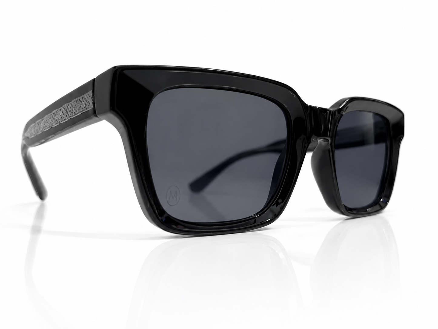 Black sunglasses with a reflective surface on a white background