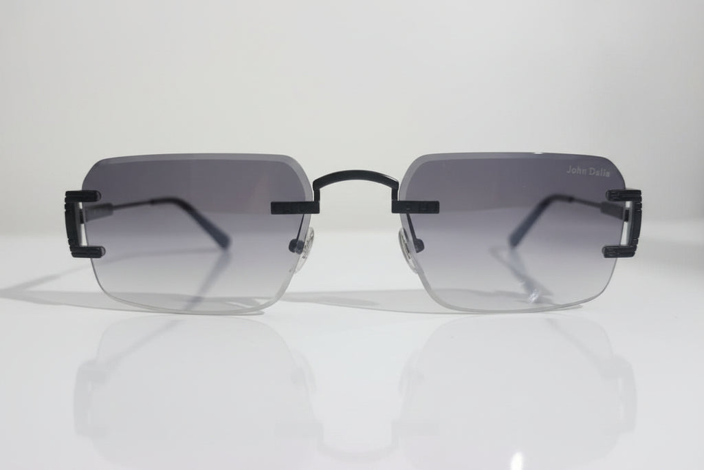 Sunglasses with black frame and clear lenses on a white surface